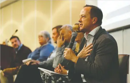  ?? Ian Kucerak ?? Mike Parker, president of the Health Sciences Associatio­n of Alberta, speaks next to other labour leaders during the Join the Resistance Town Hall at Macewan University on Monday. Parker described planned UCP government job reductions in health care as “devastatio­n.”