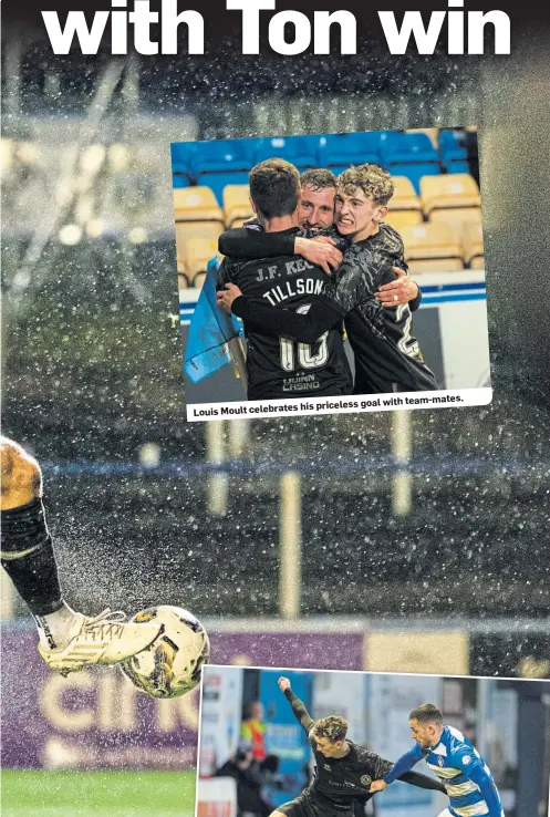  ?? ?? goal with celebrates his priceless
Louis Moult
team-mates.