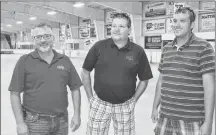  ?? ERIC MCCARTHY/JOURNAL PIONEER ?? Stacy Rix, from left, member of the board of directors of the O’Leary Community Sports Centre, Dean Getson, chair of the renovation­s committee and the facillity’s new manager, Chris Hepworth discuss the changes that are being planned for the arena.