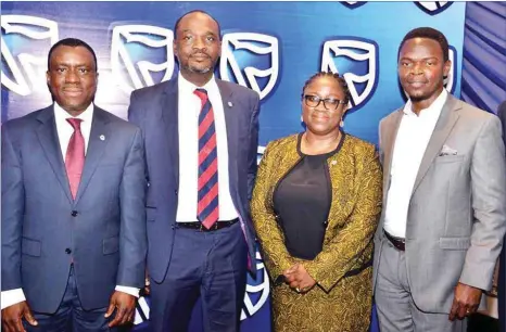  ??  ?? L-R: Chief Executive, Stanbic IBTC Bank, Dr Demola Sogunle; Executive Director, Personal / Business Banking, Mr. Babatunde Macaulay; Country Head , Human Capital, Olufunke Amobi and Partner / Lead, Digital Transforma­tion Technology, KPMG, Boye Ademola,...