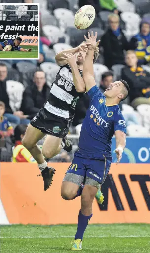  ?? PHOTO: GREGOR RICHARDSON ?? Regatherin­g . . . Otago second fiveeighth Sio Tomkinson and Hawke’s Bay winger Mason Emerson compete for Tomkinson’s chip kick during the Mitre 10 Cup match at Forsyth Barr Stadium in Dunedin last night. Tomkinson won the contest and the movement resulted in Josh Ioane scoring moments later.
