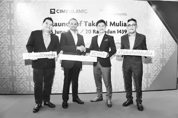  ??  ?? Rafe (second left) together with Sun Life Malaysia CEO and president/country head Raymond Lew (second right), CIMB Group regional head, Wealth Management (WM), Group Consumer Banking, Gary Yong (left), and Muhammad Fikri at the launch of CIMB Islamic’s...