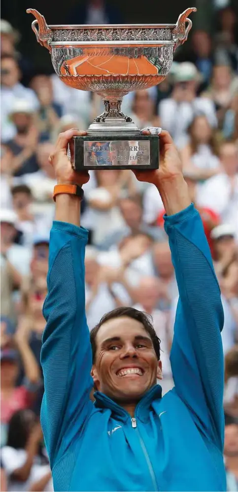  ?? FOTO: MICHEL EULER, AP/NTB SCANPIX ?? Rafael Nadal jubler etter å ha vunnet French Open i Paris for 11. gang.