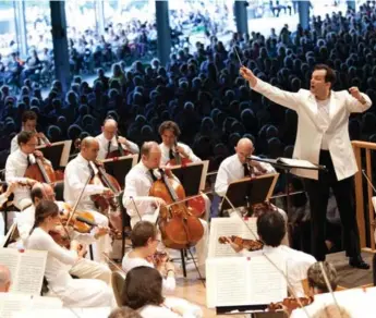  ?? HILARY SCOTT ?? Lativa’s Andris Nelsons conducts the Boston Symphony Orchestra at the Tanglewood summer music festival. Nelsons is one of the most talked-about baton-wavers of the 30-something generation, writes William Littler.