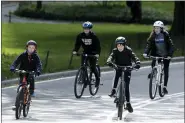  ?? FRANK FRANKLIN II - AP ?? Youngsters ride bicycles through Central Park in New York.