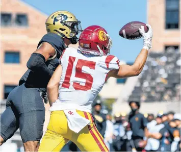  ?? DUSTIN BRADFORD/GETTY ?? USC’s Drake London (15) has logged 64 catches for 832 yards for the Trojans so far this season.
