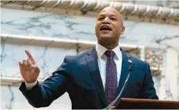  ?? JULIO CORTEZ/AP ?? Gov. Wes Moore gives his first State of the State address Feb. 1, two weeks after being sworn in. On Tuesday, he signed new laws to restrict where firearms can be carried and to make it easier for ex-offenders to have their criminal records expunged.