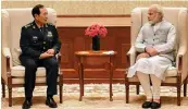  ?? — PTI ?? Prime Minister Narendra Modi and Chinese defence minister General Wei Fenghe in New Delhi on Tuesday.