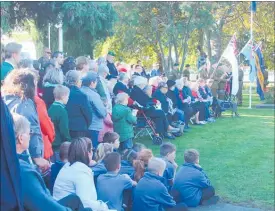  ??  ?? A large crowd gathered at 8.30am in the sunshine to enjoy the Anzac ceremony.