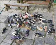  ?? (Courtesy of Selina Kok) ?? Guide Harm Jan Wilbrink keeps old shoes for mud walking at his foundation in Paesens.