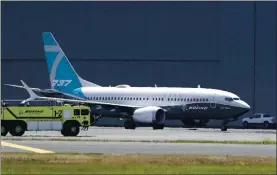  ?? ELAINE THOMPSON — THE ASSOCIATED PRESS ?? Boeing will pay $2.5 billion to settle a criminal charge related to its troubled 737Max jetliner. The Justice Department announced the settlement on Thursday. Boeing shares fell 1 percent.