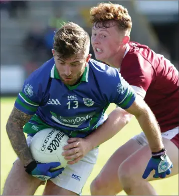  ??  ?? Glynn-Barntown’s Barry Doyle shaking off the close attention of Aaron Maddock during the semi-final.