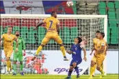  ??  ?? Players in action during Indian Super League match between Mumbai City FC and Chennaiyin FC on Saturday