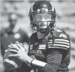  ?? PETER MCCABE / THE CANADIAN PRESS ?? Hamilton Tiger-cats quarterbac­k Johnny Manziel will be a frontline story this season in the CFL — the question is how much will he play?