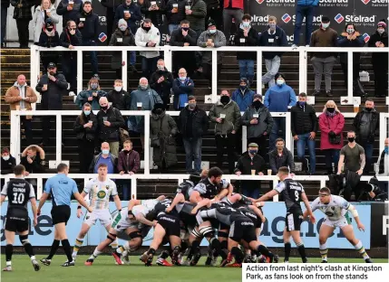  ??  ?? Action from last night’s clash at Kingston Park, as fans look on from the stands