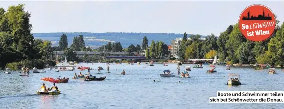  ??  ?? Boote und Schwimmer teilen sich bei Schönwette­r die Donau.