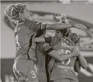  ?? Rick Bowmer / Associated Press ?? Dash midfielder Kristie Mewis (19) scored the first goal versus the Reign in the 12th minute on Saturday.