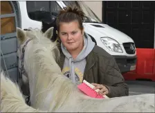  ??  ?? Demi Quirke from Glin getting her pony Sparkle all glittering at the outset of the Listowel Horse Fair on Thursday.