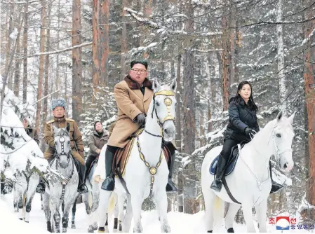  ?? KCNA VIA REUTERS ?? North Korean leader Kim Jong Un rides a horse as he visits battle sites in areas of Mt. Paektu, Ryanggang, North Korea.