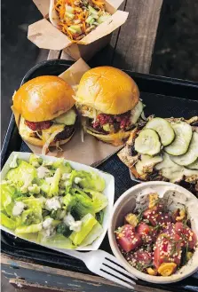  ?? SUNNY SHOKRAE/W.W. NORTON & COMPANY ?? Affordabil­ity is key, chef Brooks Headley says of the vegetarian fare at his six-seat restaurant Superiorit­y Burger in New York City: “Nothing on the menu is over $9.”