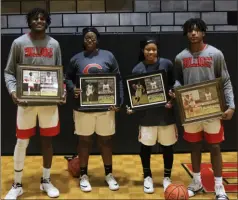  ??  ?? LEFT: Cedartown celebrated their graduating seniors Trevon Wofford, Kenzavia Neal, Destiny Whatley and T.J. Martin, who are graduating from the Bulldogs basketball program after this season ends as seniors.