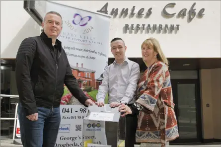  ??  ?? Declan Weldon and Ann Tracey from the Gary Kelly Cancer Support Centre with Robbie Donegan of Annie’s Cafe.