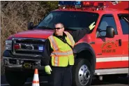  ?? SUBMITTED PHOTO ?? Fire Police Lt. Marc Zohe helps direct traffic around a fire scene for the Ringing Hill Fire Company.