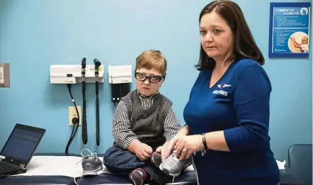  ??  ?? Krystosek and Levi (left) during a January visit to Lurie Children’s Hospital in Chicago, Illinois. — TNS