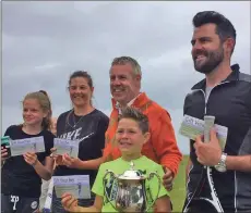  ??  ?? Finalists at the Reynier-McDavid Tennis Cup were, left to right, runners-up Olivia Easson and Joanne Thompson, Ken Macfarlane, tournament director, and the winners Struan and Steven Thompson.