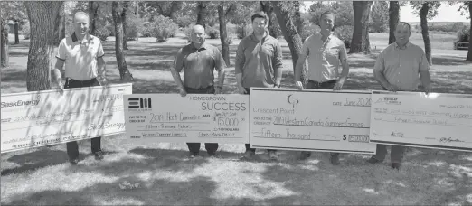  ?? Photo by Matthew Liebenberg ?? Sponsors made cheque presentati­ons to the 2019 Western Canada Summer Games host committee, June 20. From left to right, SaskEnergy General Manager Southwest Area Mike Rossiter, Stark & Marsh Director of Operations Darcy Congdon, Friends of the Games...