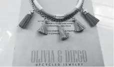  ??  ?? Shown in this photo is the Giselle statement necklace of Olivia & Diego.