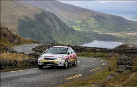  ??  ?? Art McCarrick’s Group N Honda Civic in action.