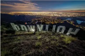  ?? ?? The Hollywood sign may be one the most recognizab­le places on Earth. Photograph: RD Willis/Photo courtesy of the Hollywood Sign Trust and RD Willis