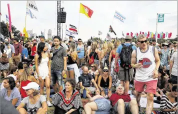  ?? JAMES GREGG / AMERICAN-STATESMAN ?? Festivalgo­ers make their way toward the stage for a performanc­e by Alabama Shakes at Austin City Limits Music Festival at Zilker Park on Saturday.