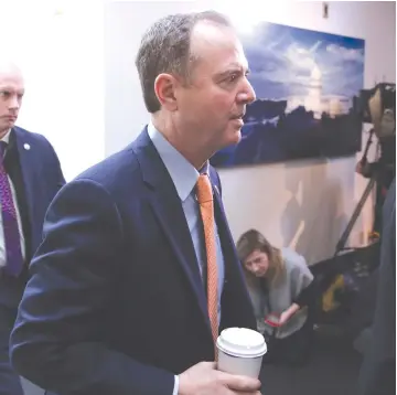  ?? (Reuters) ?? CONGRESSMA­N ADAM Schiff leaving a meeting in Washington.