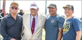  ?? PHOTO VINCENT OSUNA ?? USMC World War II veteran Richard Dockstader, of Brawley, (second from left) poses with his son Duane Dockstader (left), grandson Richard Dockstader (right) and great grandson Dustin Dockstader (far right) during the USMC Battle Colors Detachment ceremony on Thursday at Veterans’ Field in Calipatria.