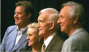  ?? Associated Press ?? ■ Tammy Genovese, second left, Country Music Associatio­n Chief Operating Officer, poses for a photo with Vince Gill, left, Ralph Emery and Mel Tillis, right, Tuesday, Aug. 7, 2007, in Nashville, Tenn., after it was announced that the three men will be inducted into the Country Music Hall of Fame. Emery, who became known as the dean of country music broadcaste­rs over more than a half-century in both radio and television died Saturday his family said. He was 88.