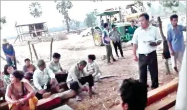  ?? SUPPLIED ?? District authoritie­s meet with villagers in late February in Preah Vihear over the seizure of machinery being used to clear forestland. Six villagers refused to appear for questionin­g on Wednesday over the case, fearing arrest.