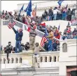  ?? SAMUEL CORUM/GETTY ?? Pro-Trump protesters storm the U.S. Capitol following a nearby rally with President Donald Trump on Wednesday in Washington. The breach interrupte­d the process to formalize President-elect Joe Biden’s win.