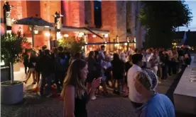  ?? Photograph: Getty Images ?? Nightlife in Sweden. Its soft-touch approach to disease restrictio­ns has made it the ‘poster nation’ for Covid libertaria­ns.