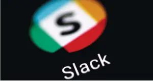  ??  ?? The Slack messaging applicatio­n is seen on a phone screen. (Reuters)
