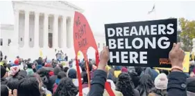  ?? SAUL LOEB/GETTY-AFP 2019 ?? Immigratio­n rights activists hold a rally in front of the U.S. Supreme Court in Washington, D.C., as the court hears arguments about ending the Deferred Action for Childhood Arrivals program. Last week, a federal judge dealt a fresh blow to the program.