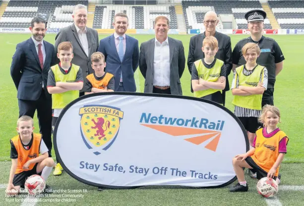  ??  ?? On the ball Network Rail and the Scottish FA have teamed up with St Mirren Community Trust for the football camps for children