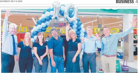  ??  ?? EXPANSION: Townsville councillor Les Walker ( left) and the Fairfield team Shantelle Jones, Amanda McCabe, Chris Fusco, Debbie Gelling, Steven Titmus and Adam Martin mark the centre’s 10th year of trading.