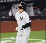  ?? Sarah Stier / Getty Images ?? The Yankees’ Aaron Judge reacts after hitting a three-run home run against the Orioles at Yankee Stadium on Tuesday.