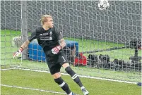  ?? AP ?? Liverpool goalkeeper Loris Karius fumbles Gareth Bale’s long-range shot into his own net.