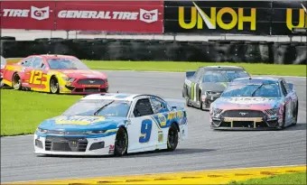  ?? TERRY RENNA/AP PHOTO ?? Chase Elliott (9) leads Kevin Harvick (4), Kurt Busch (1) and Ryan Blaney through Turn 3 during a NASCAR Cup Series race on Sunday at Daytona Internatio­nal Speedway in Daytona Beach, Fla.