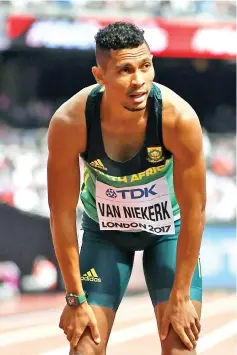  ?? — AFP photo ?? South Africa's Wayde Van Niekerk finishes a heat of the men's 400m athletics event at the 2017 IAAF World Championsh­ips at the London Stadium in London on August 5, 2017.