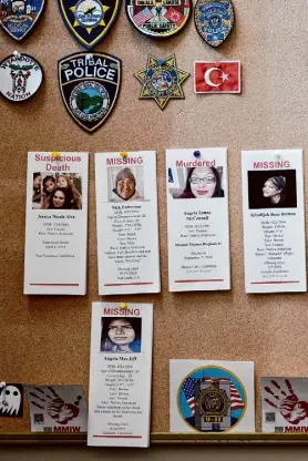  ?? ?? Flyers in Julia Oliveira’s office in Klamath concern cases she is investigat­ing. Her “rolling office” is a Ford Explorer.