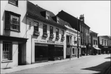  ?? ?? 1963 - Further along on the same side of the street was once the premises of W.H. Gibbs furnisher, The Lord Roberts public house and Dennes the seed merchants - all long gone